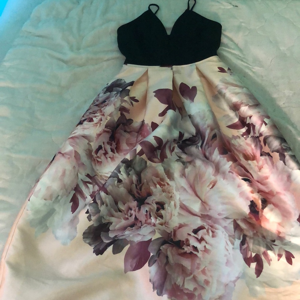 Long dress with black top and flower design